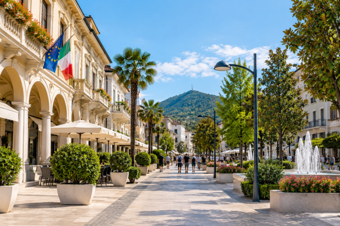 Tari Abano, vista del centro cittadino con portici, negozi e area pedonale.